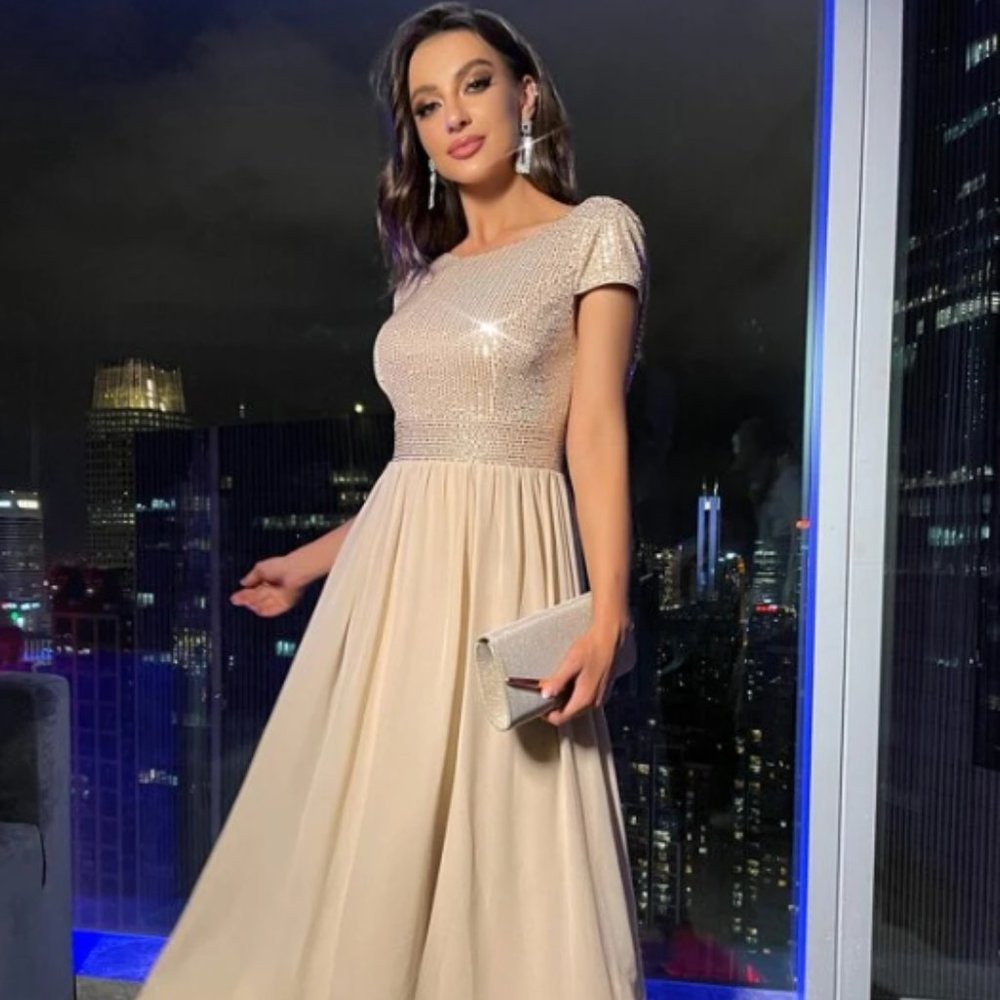 Dress with sequin bodice and draped back